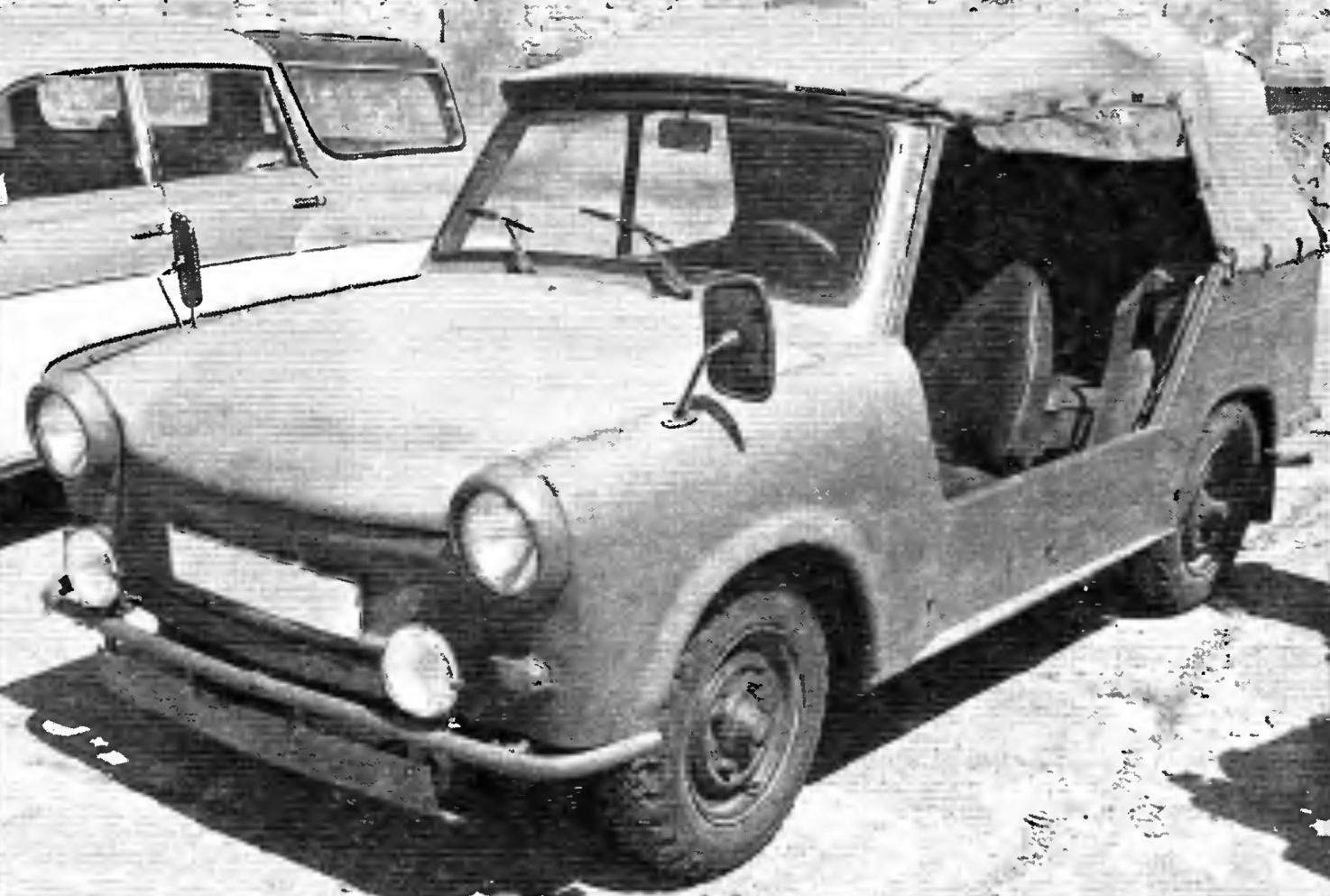 Military variant of the small car Trabant P601 Kubel. As claimed, these vehicles were patrolling the Berlin wall of course, on the East side,