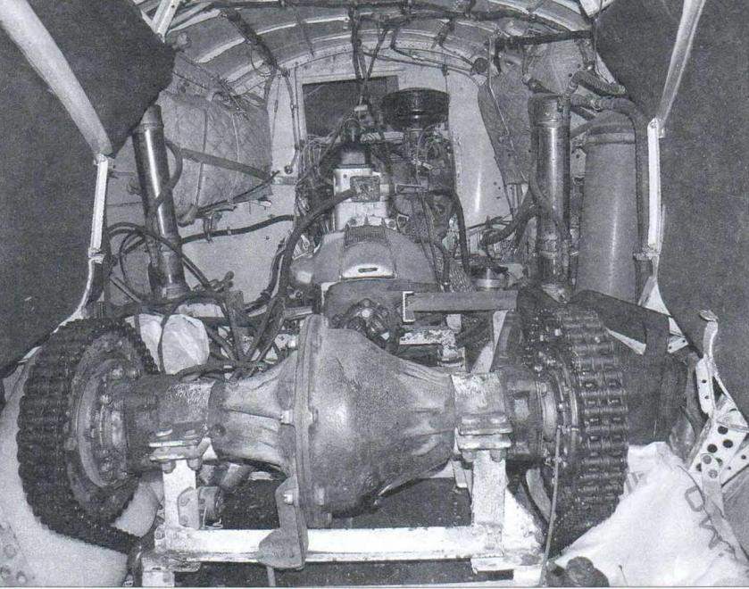 The engine compartment of a snowmobile