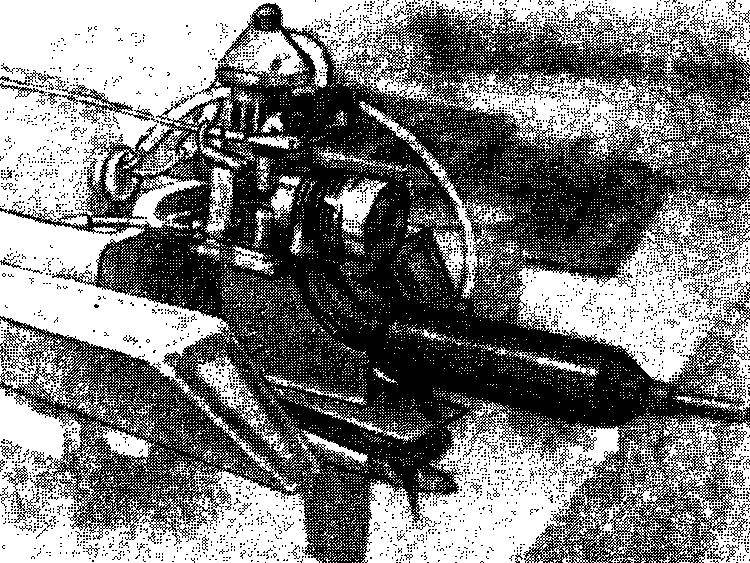 The aft model with all-moving engine. The drive of the propeller by a flexible shaft connecting the vertically disposed crankshaft of the engine with a horizontal propeller shaft.