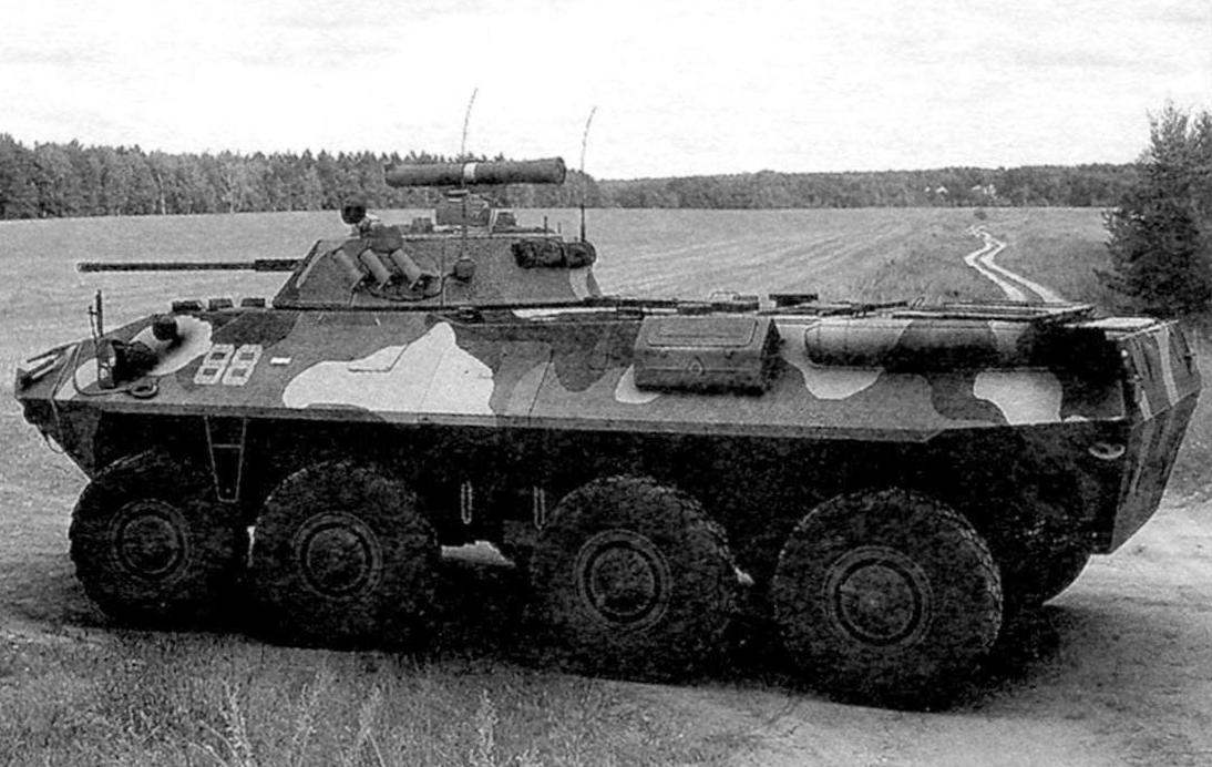 Armored personnel carrier with a rocket 9М113 on the launcher