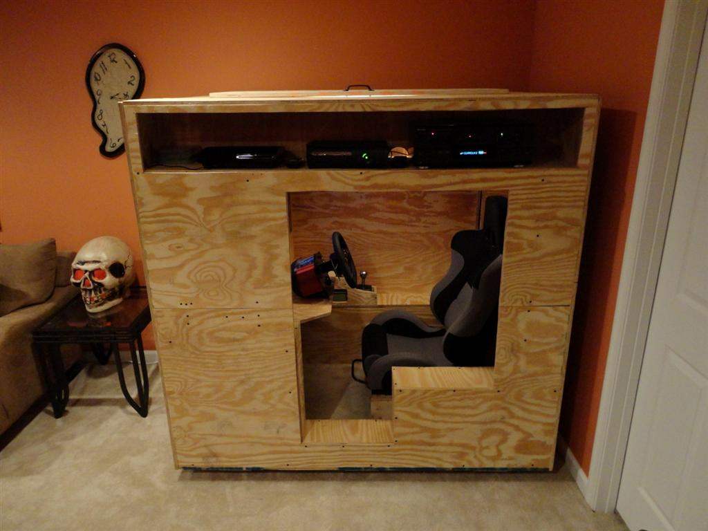 Wooden cockpit for racing video games has made us a fan of auto simulators, Matthew Boyer. From $1650 about a third went to a game steering wheel high level.