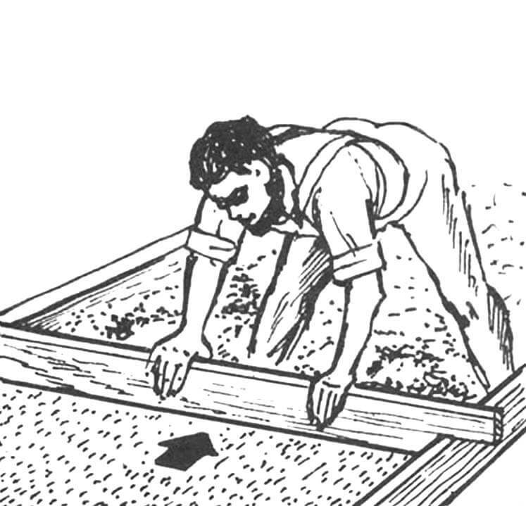 Рис. 3. Выравнивание песчаной подушки дощатым шаблоном