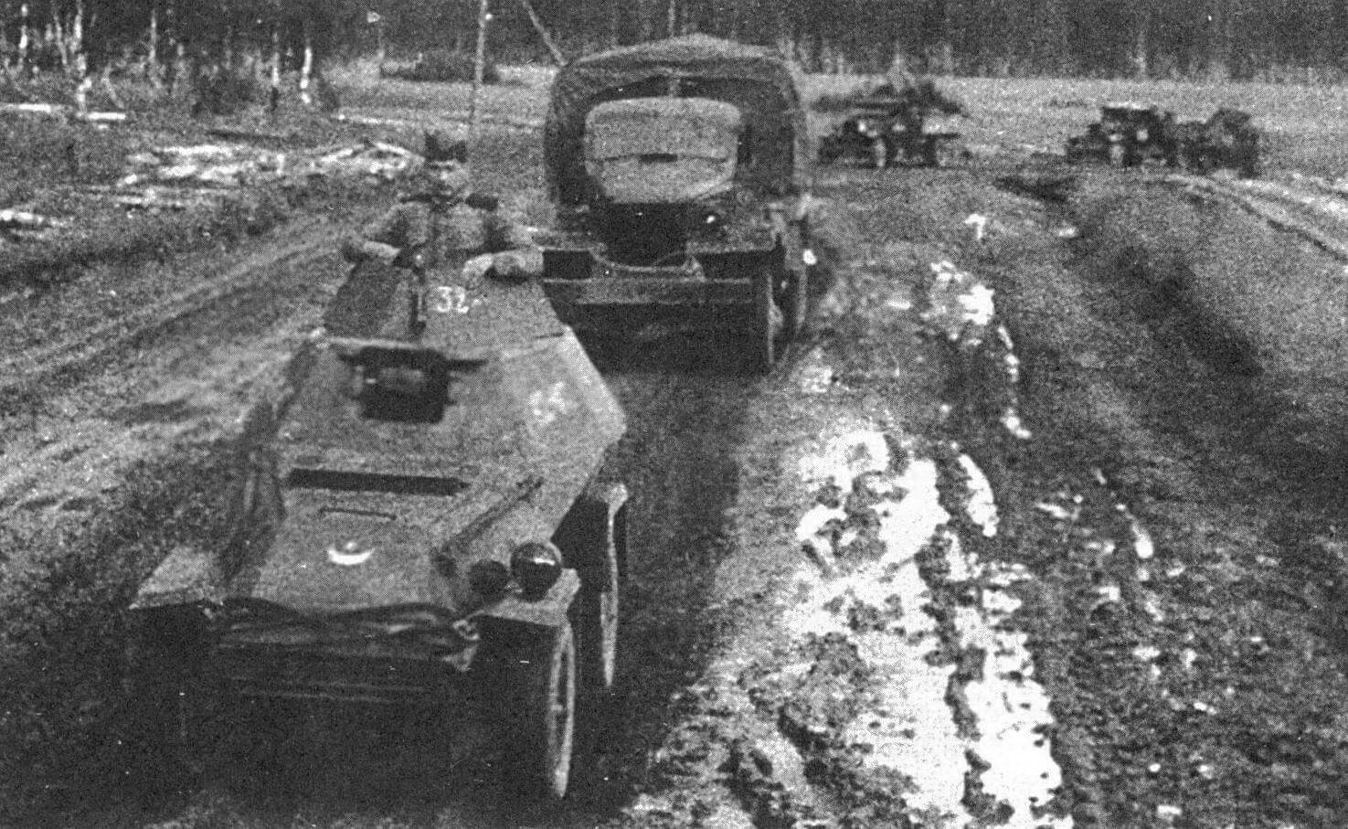 Бронеавтомобиль БА-64 в охранении транспортной колонны. Западный фронт, 1943 год