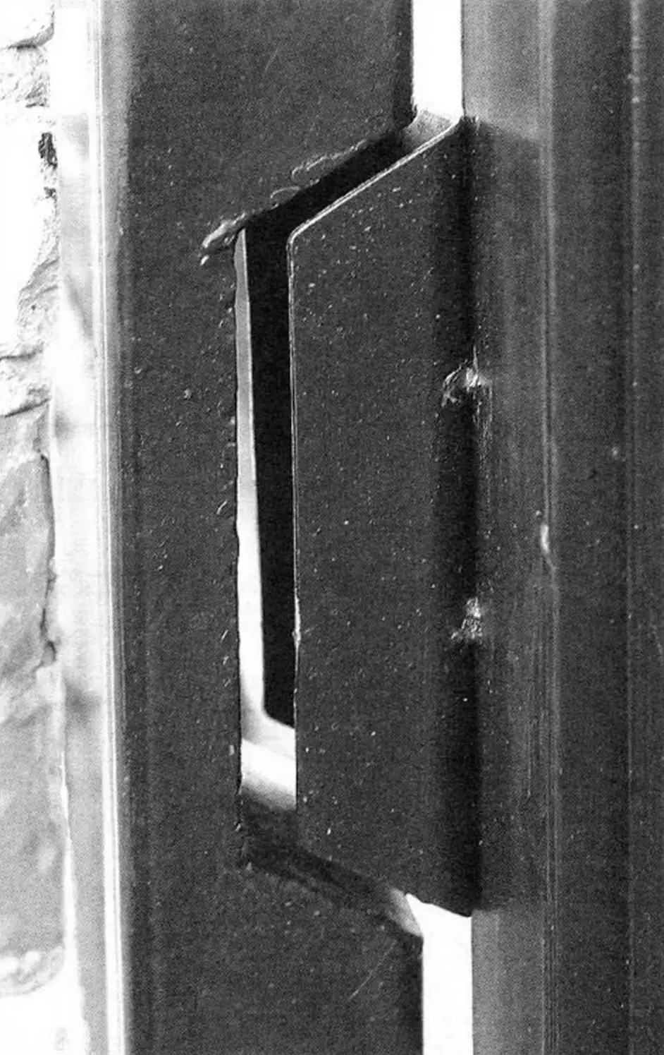 Door handle opening covered with cut profile