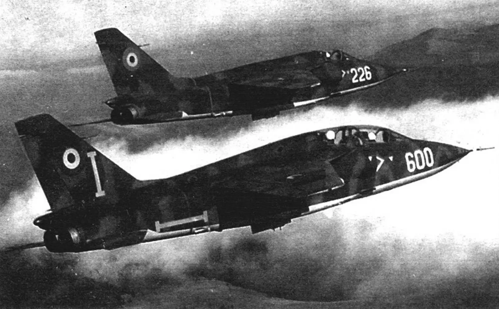 In flight - Romanian IAR-93B DC (two-seat) and IAR-93B (single-seat) with post-revolutionary Air Force markings