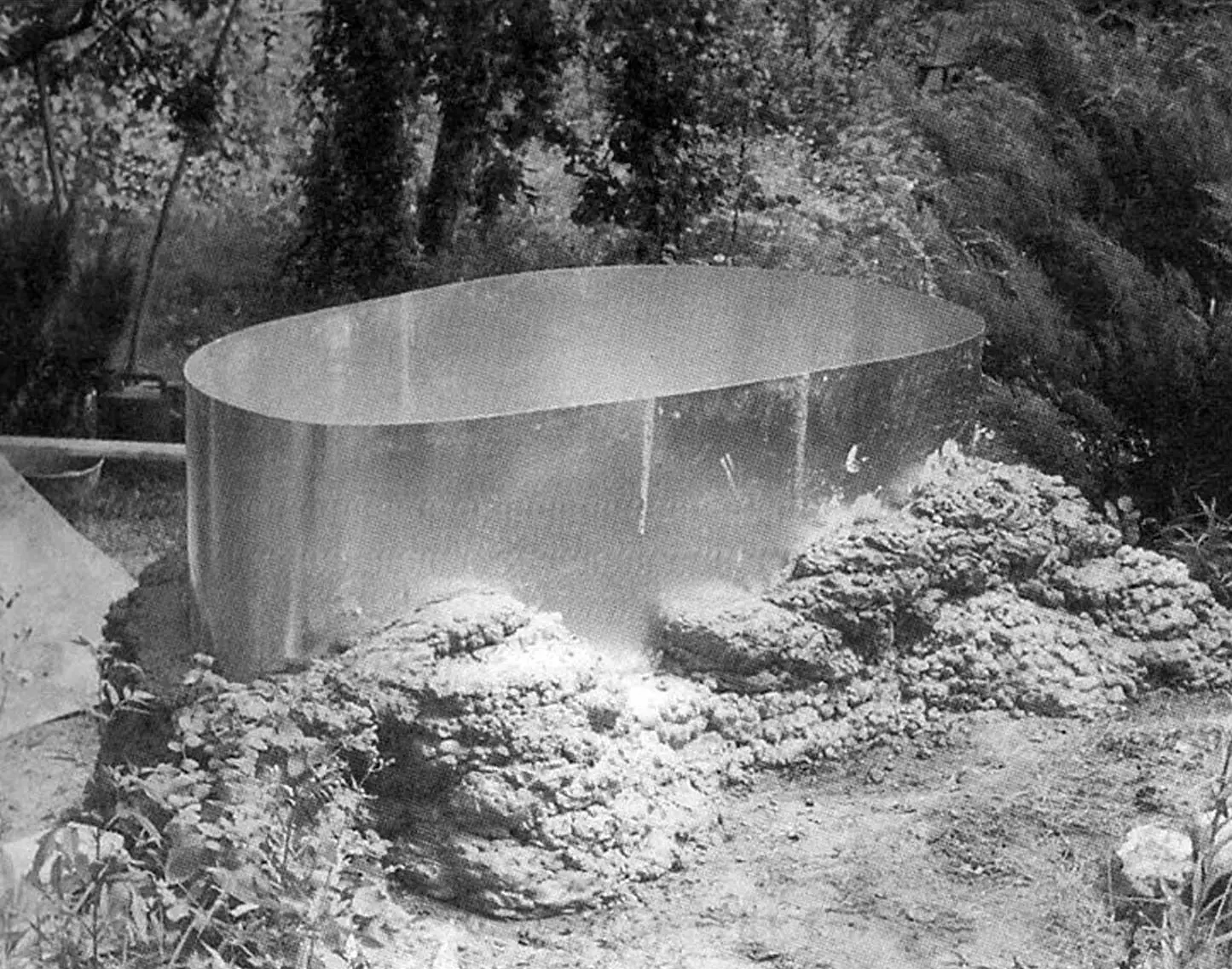 Intermediate stage of building the reservoir walls: view from the upper terrace