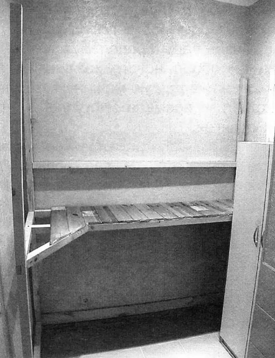 Lower shelf of the unit during assembly in the utility room