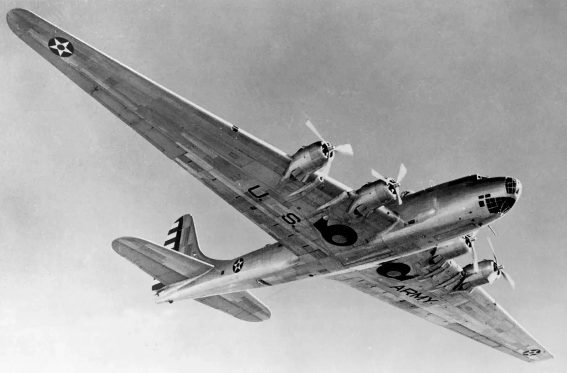 XB-19 from below. Huge main wheels retract flush with the wing underside