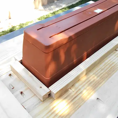 Frame for plastic planter