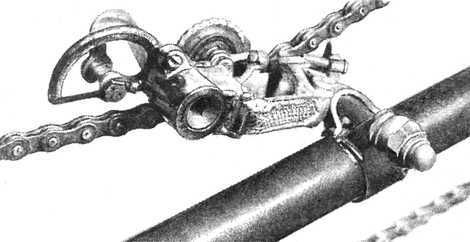 Installing the tension roller of the front drive chain.