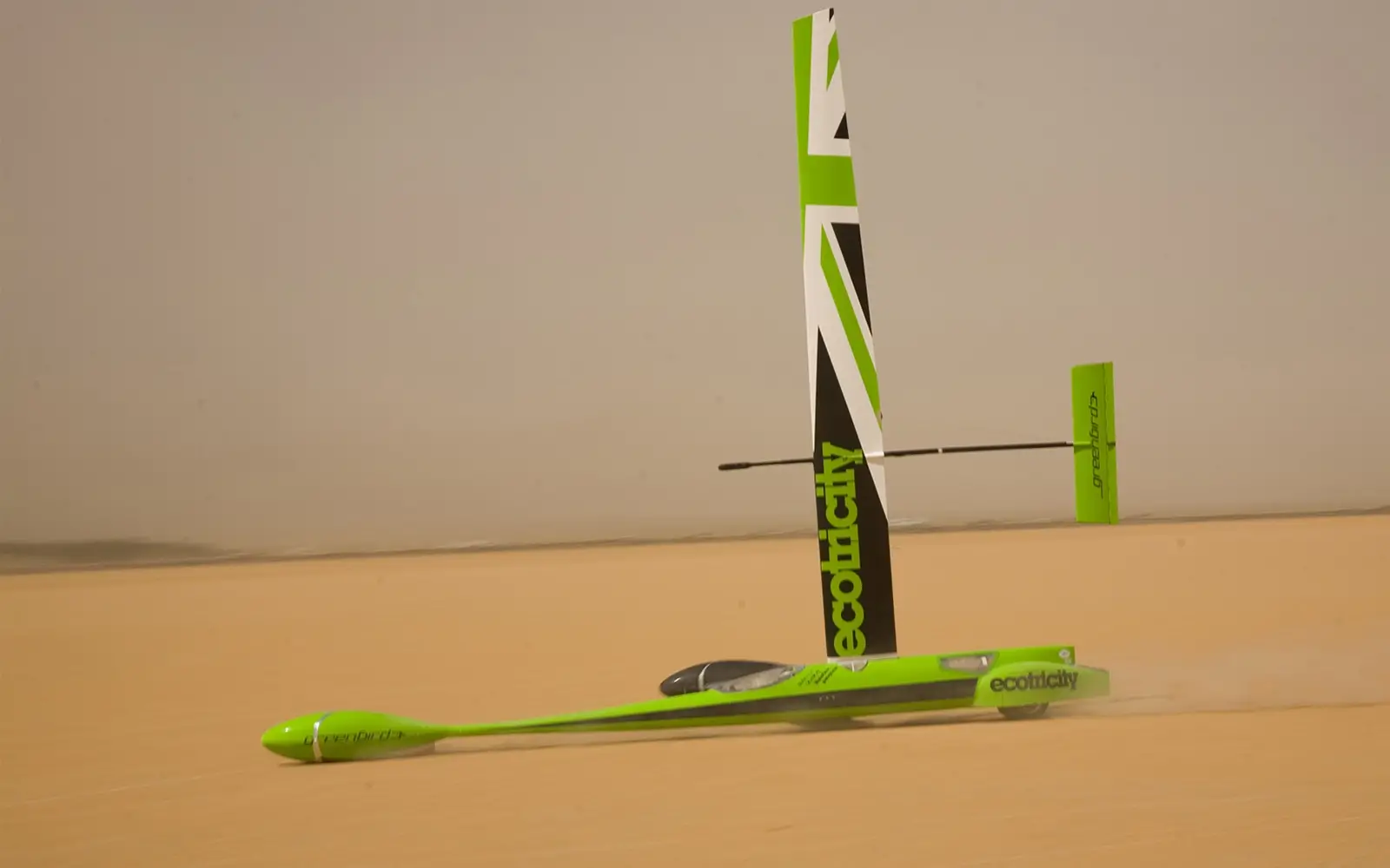 The designer and pilot of this land yacht (wind-powered vehicle) Greenbird with a vertical wing sail — Briton Richard Jenkins — on the surface of the dry lake Ivanpah in the Nevada desert in California on March 26, 2009, set a new speed record for such craft of 202.9 km/h, which is 3–5 times faster than the wind driving it